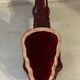 Ruby red ceramic pocket ashtray from Vallauris, numbered.