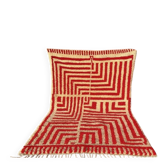 Handmade traditional orange and white Beni Ourain rug.