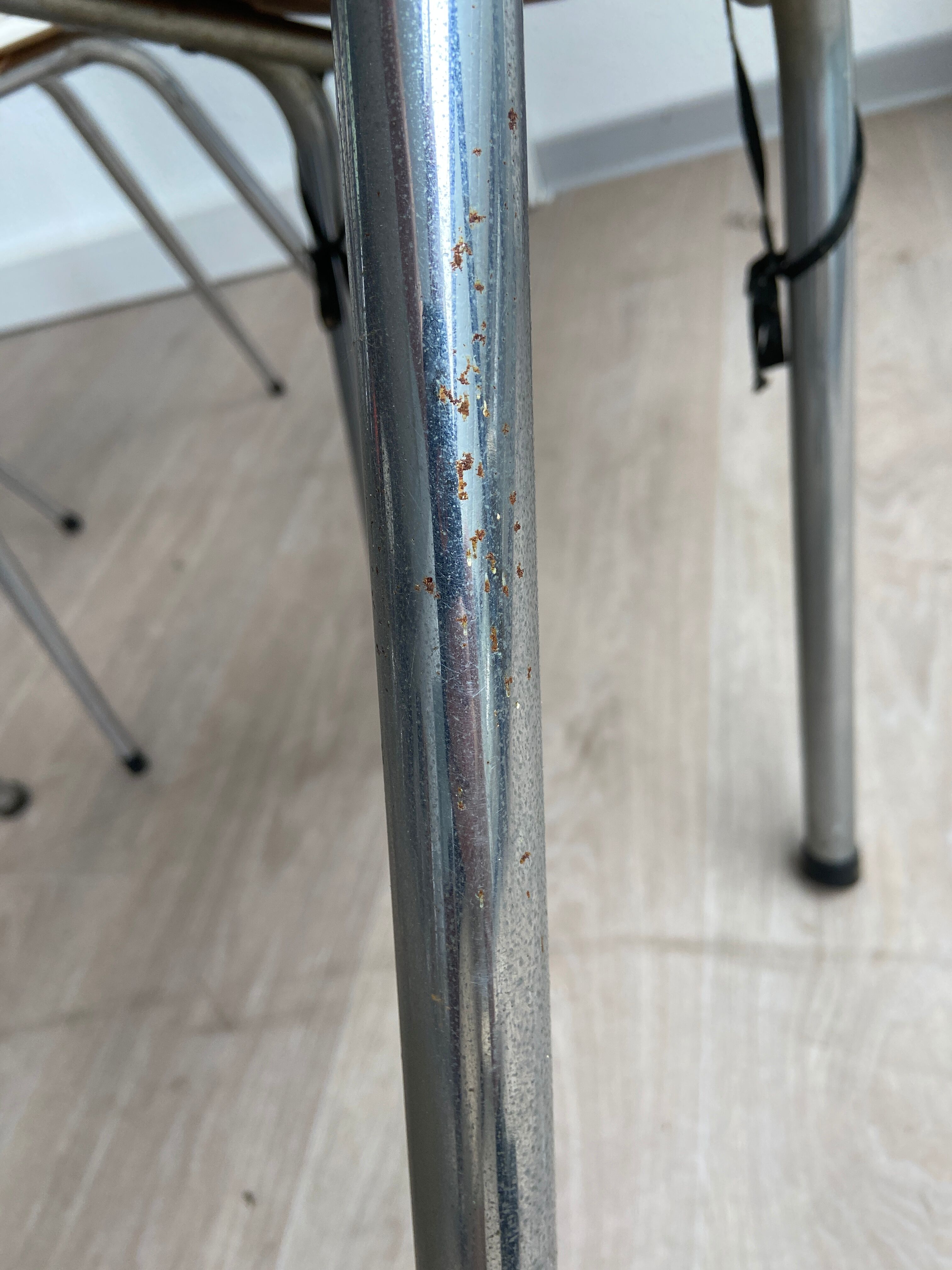 10 mismatched multicolored Formica chairs 60s