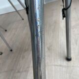 10 mismatched multicolored Formica chairs 60s