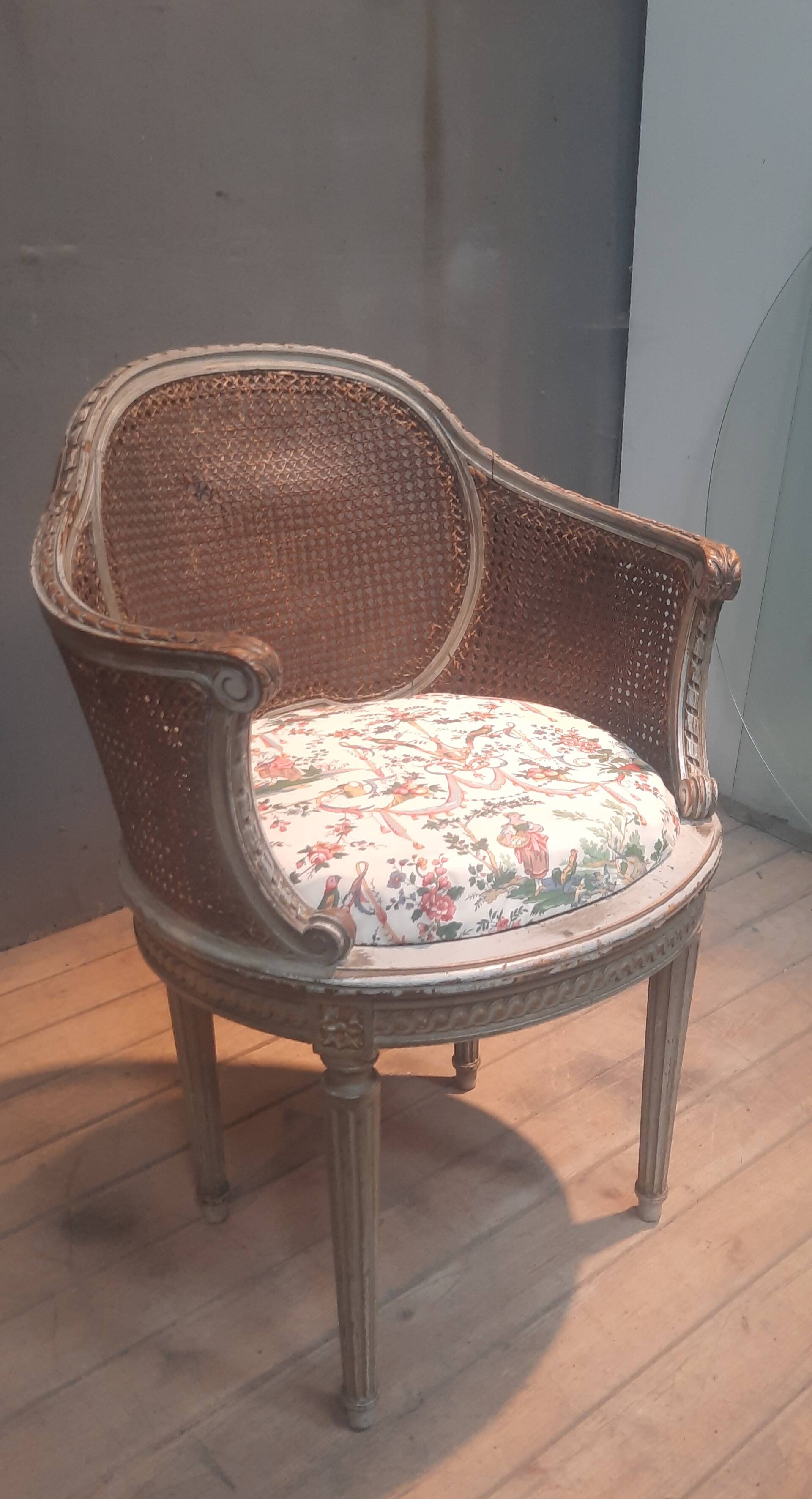 Caned armchair in Louis XVI style