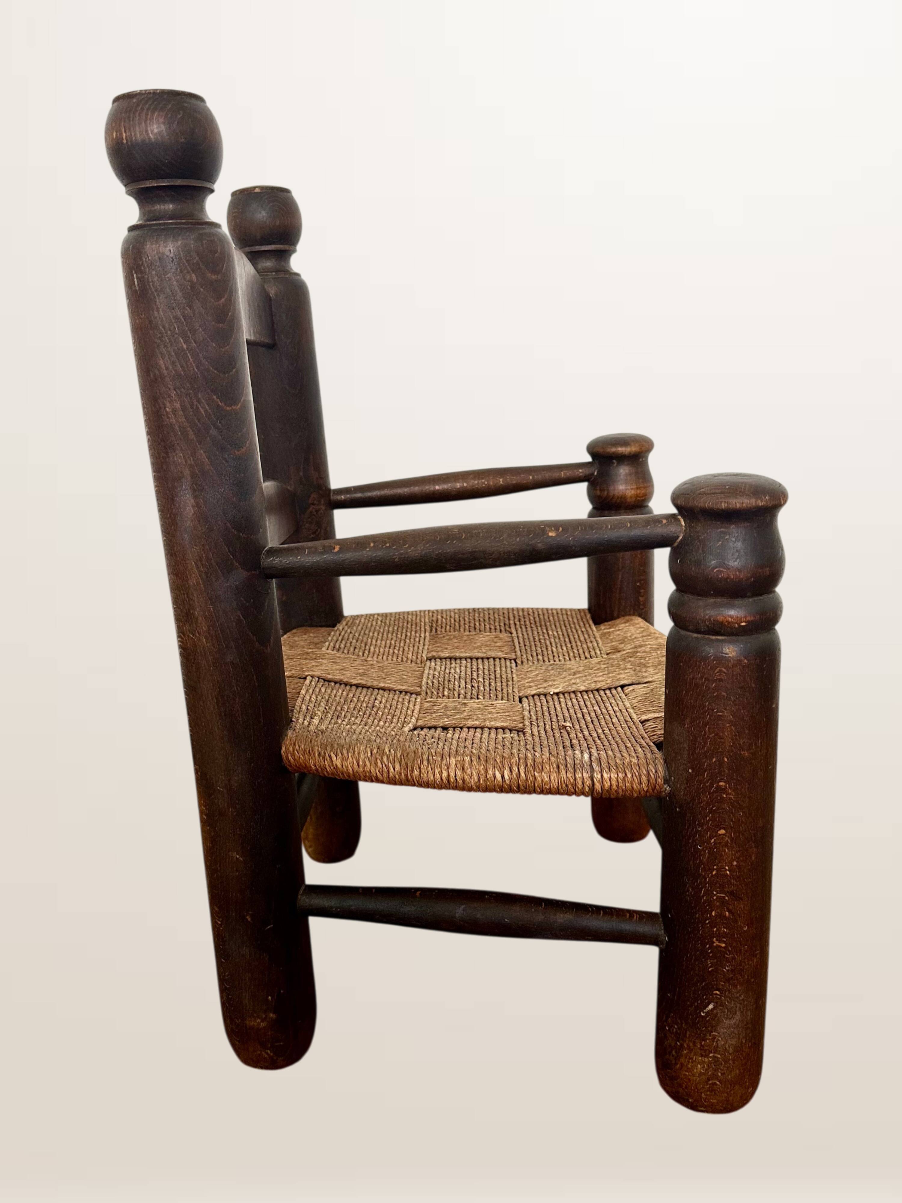 Child's armchair in the style of Charles Dudouyt.