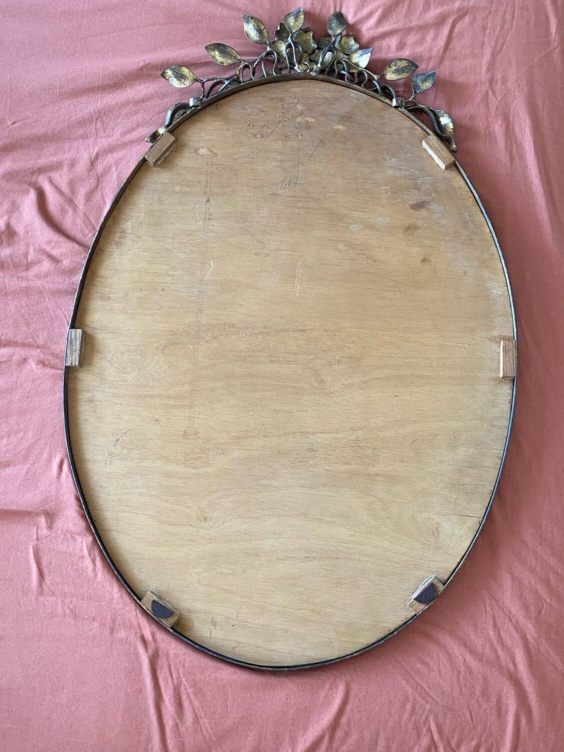 Old bronze frame mirror
