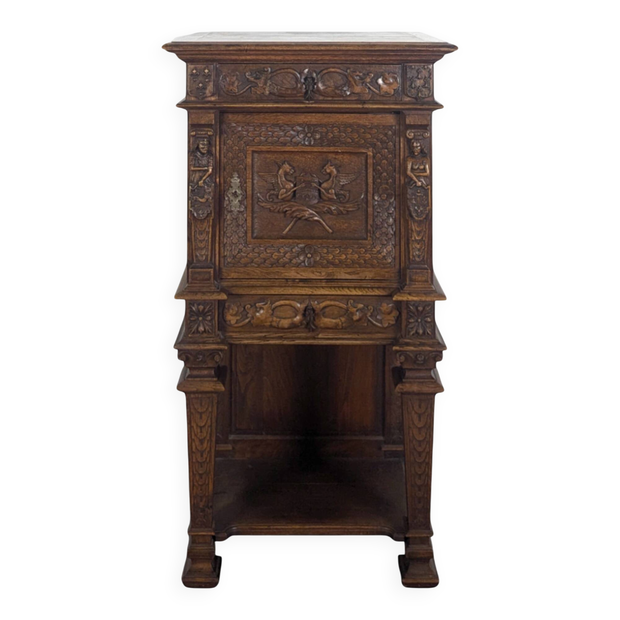 Renaissance-style cabinet in solid oak decorated with chimeras and caryatids
