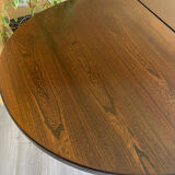 Extendable oval table Baumann, for up to 12 place settings.