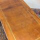 Cherry wood desk with a leather top.