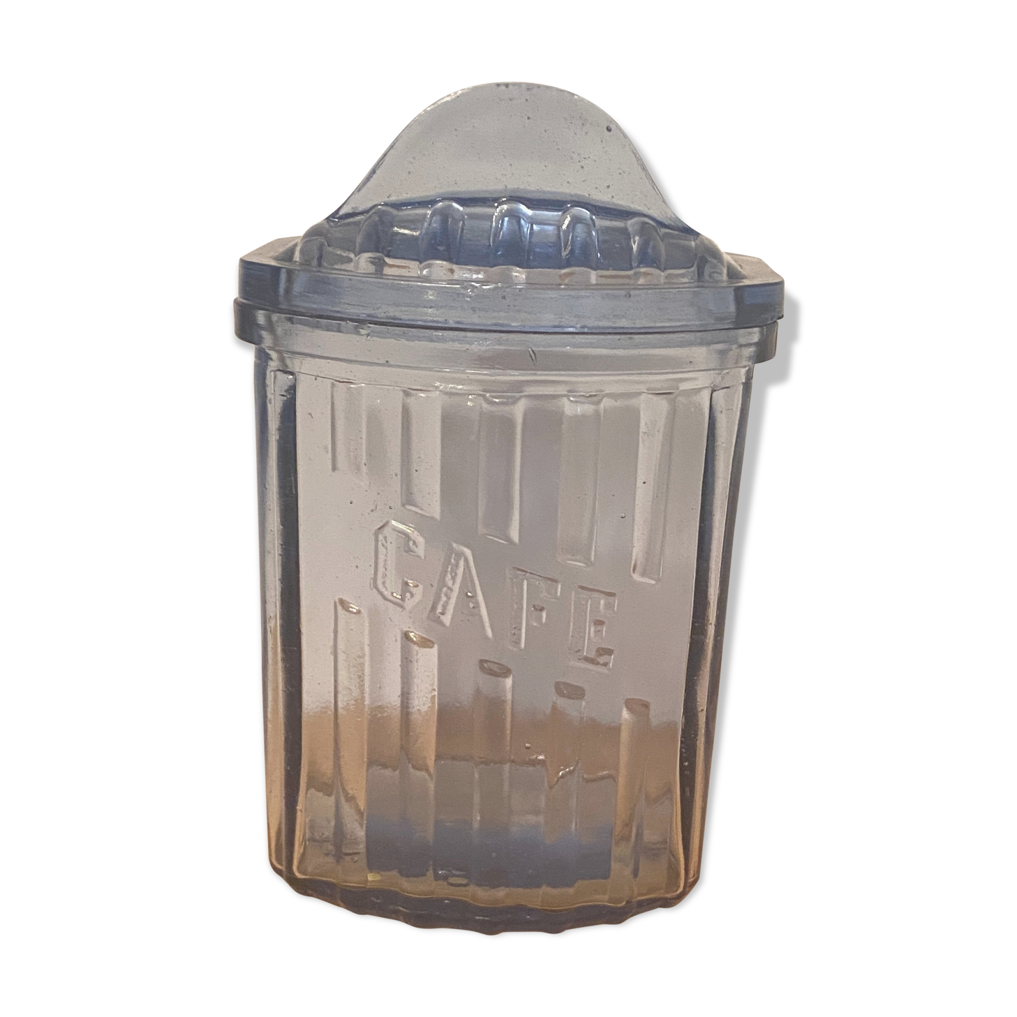 Old coffee pot in blue glass