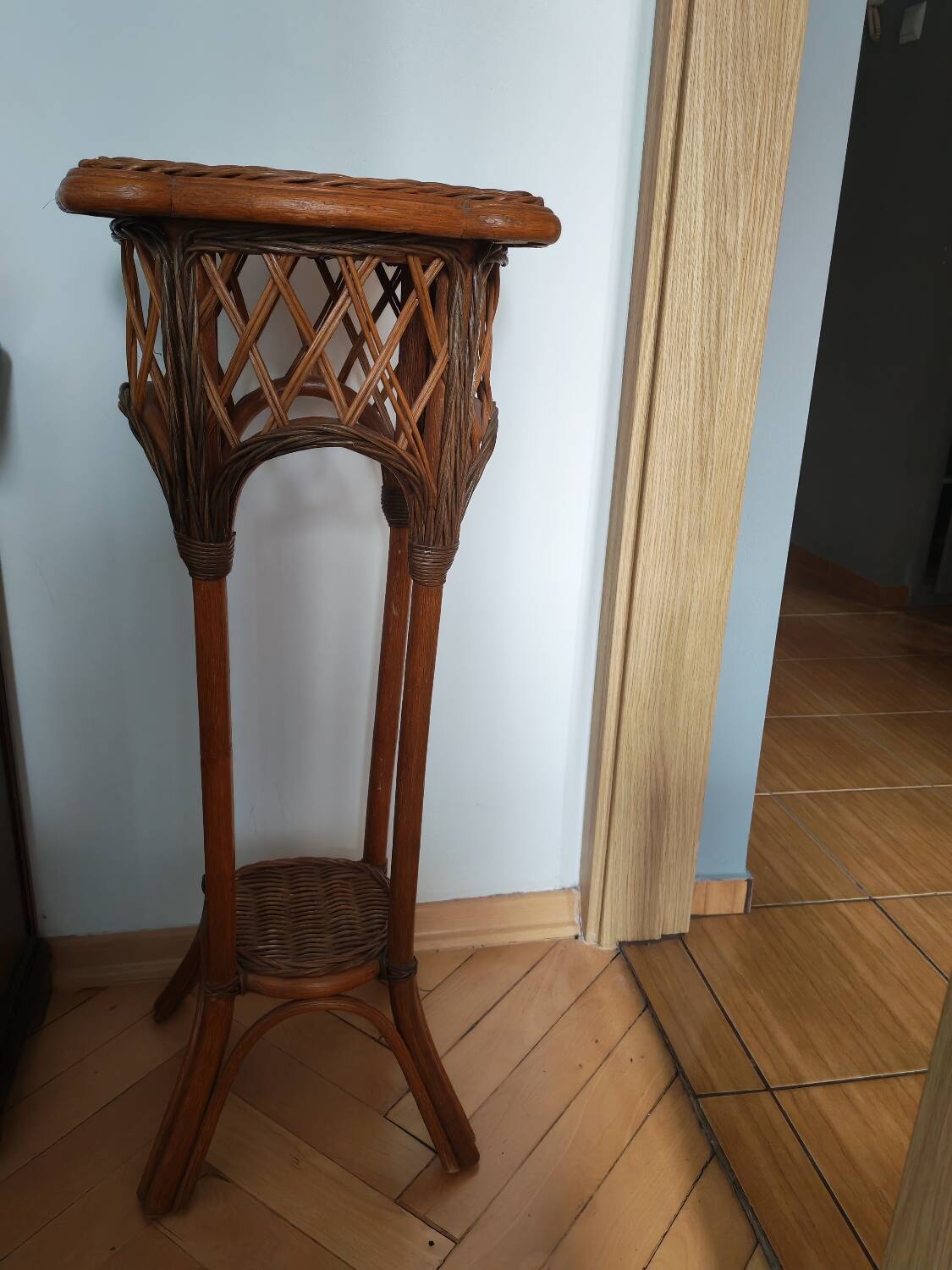 Woven wood and rattan plant stand