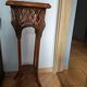 Woven wood and rattan plant stand