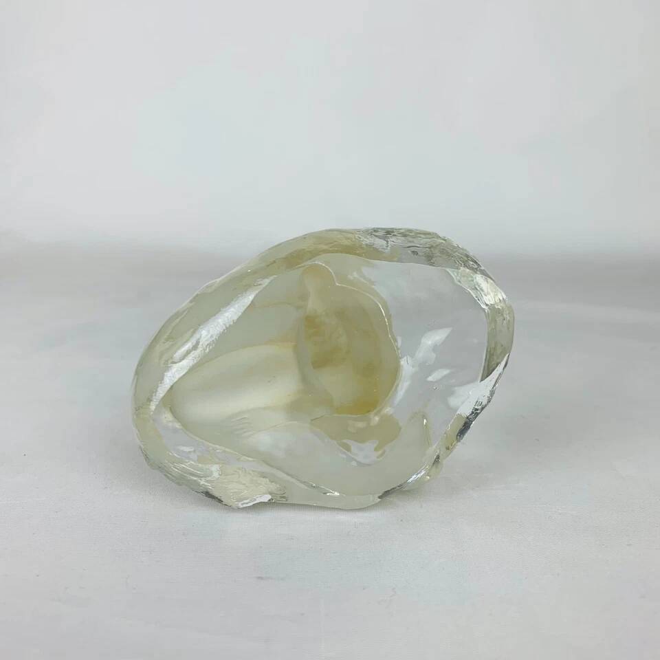 Vintage moulded glass mermaid sculpture.