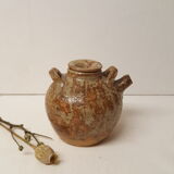 Pot with lid and double sandstone handle