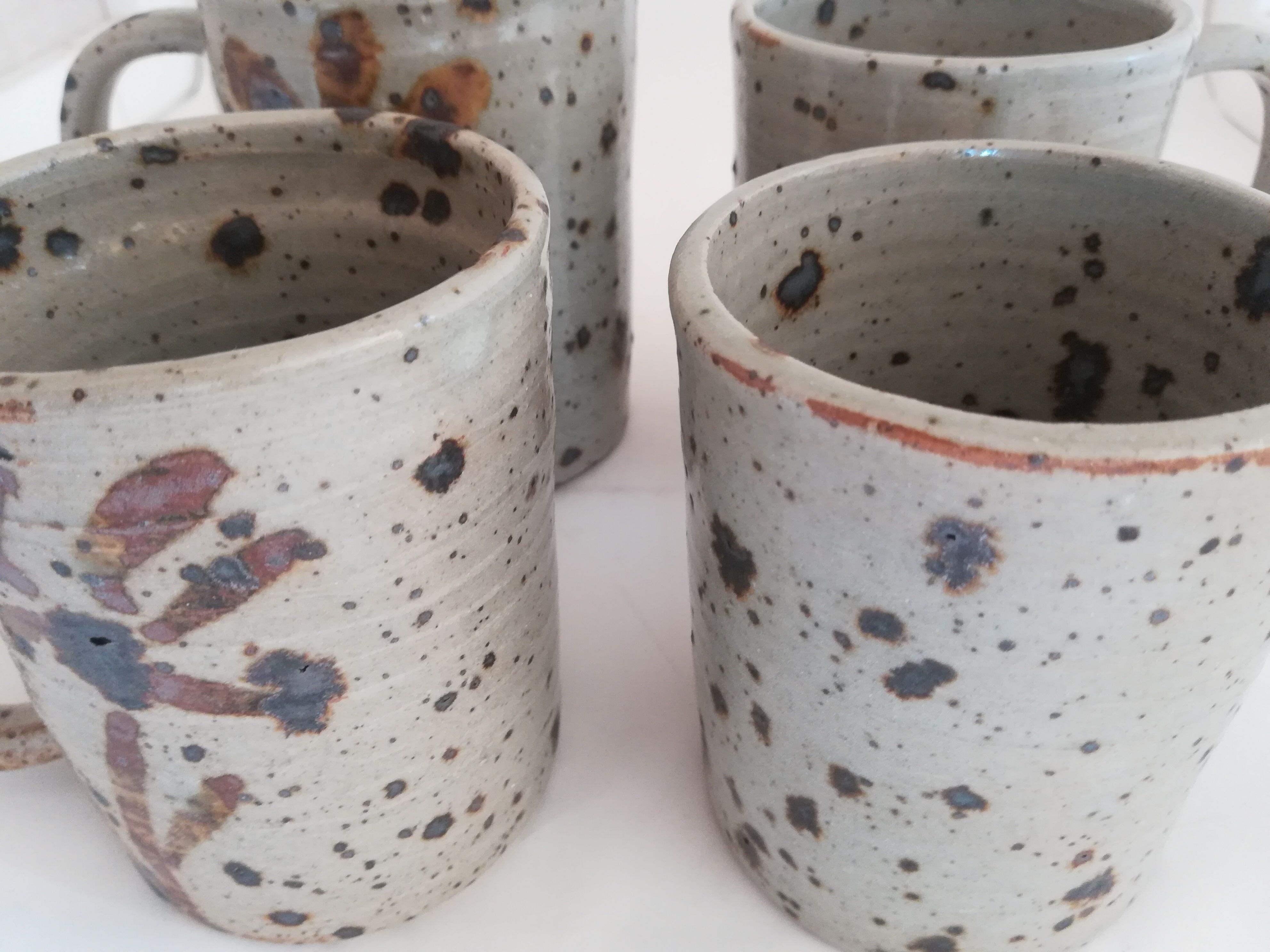 Set of four terracotta mugs