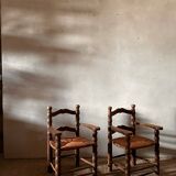 Pair of French spindle chairs in the style of Charles Dudouyt.