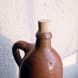 Oil bottle in sandstone 29 cm