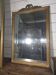 Golden mirror in Louis XVI style