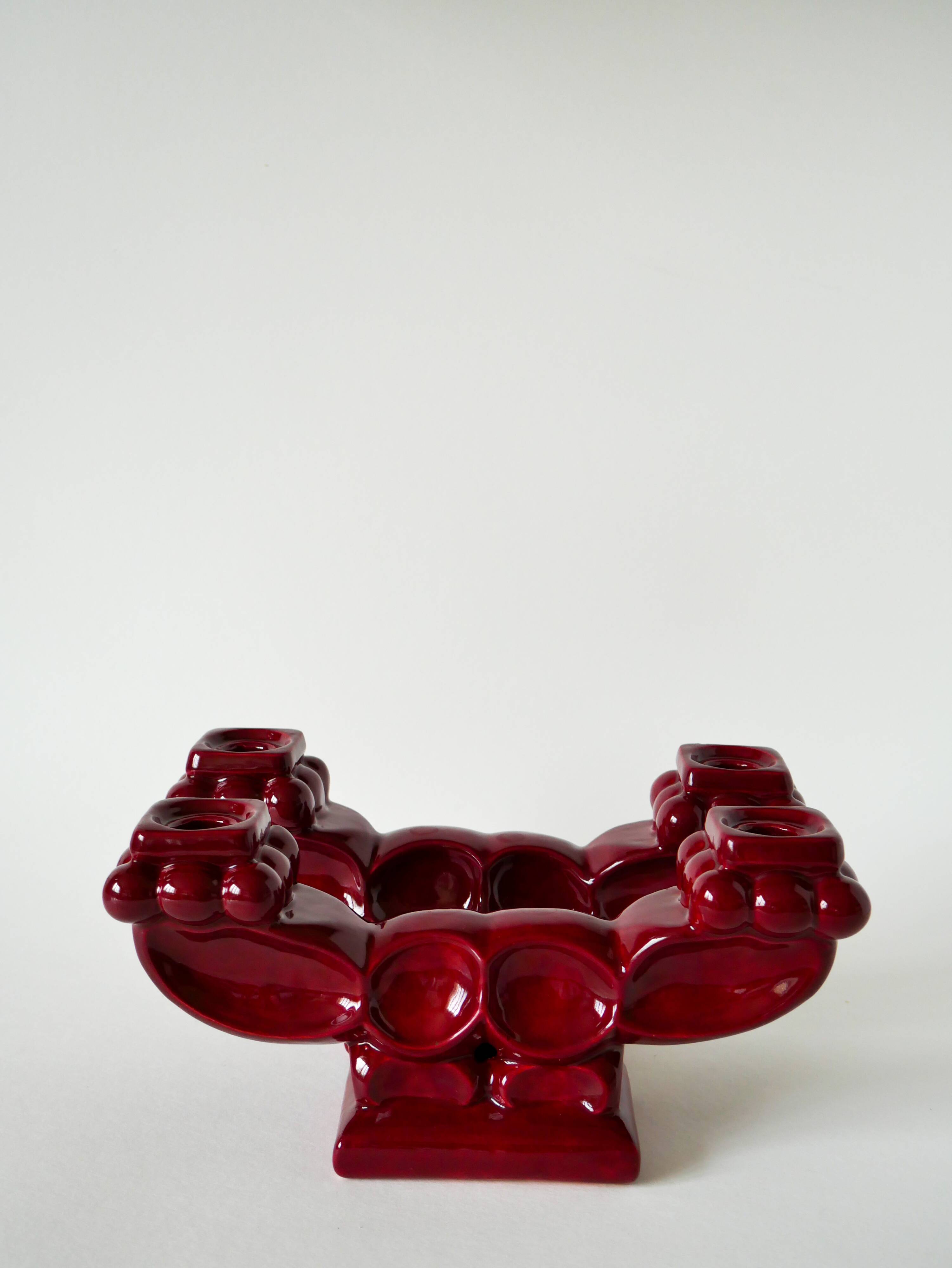Pair of large burgundy ceramic candlesticks, 1950