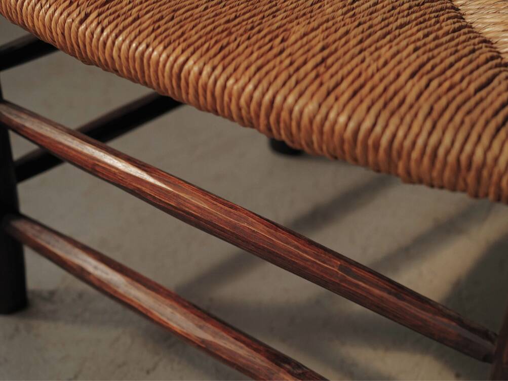 Pair of solid wood and straw armchairs, France, circa 1950.