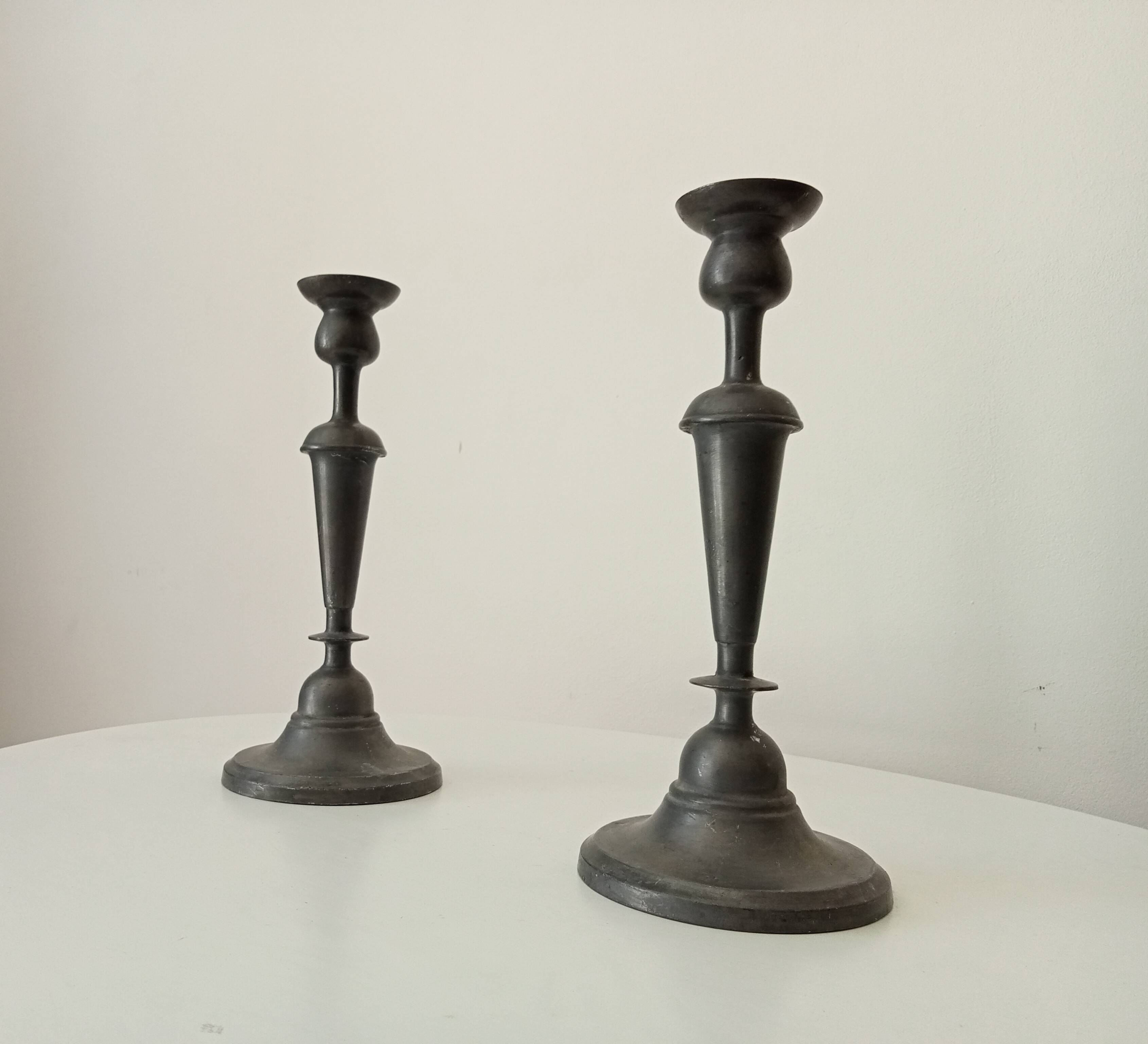 Pair of large old candlesticks in solid pewter