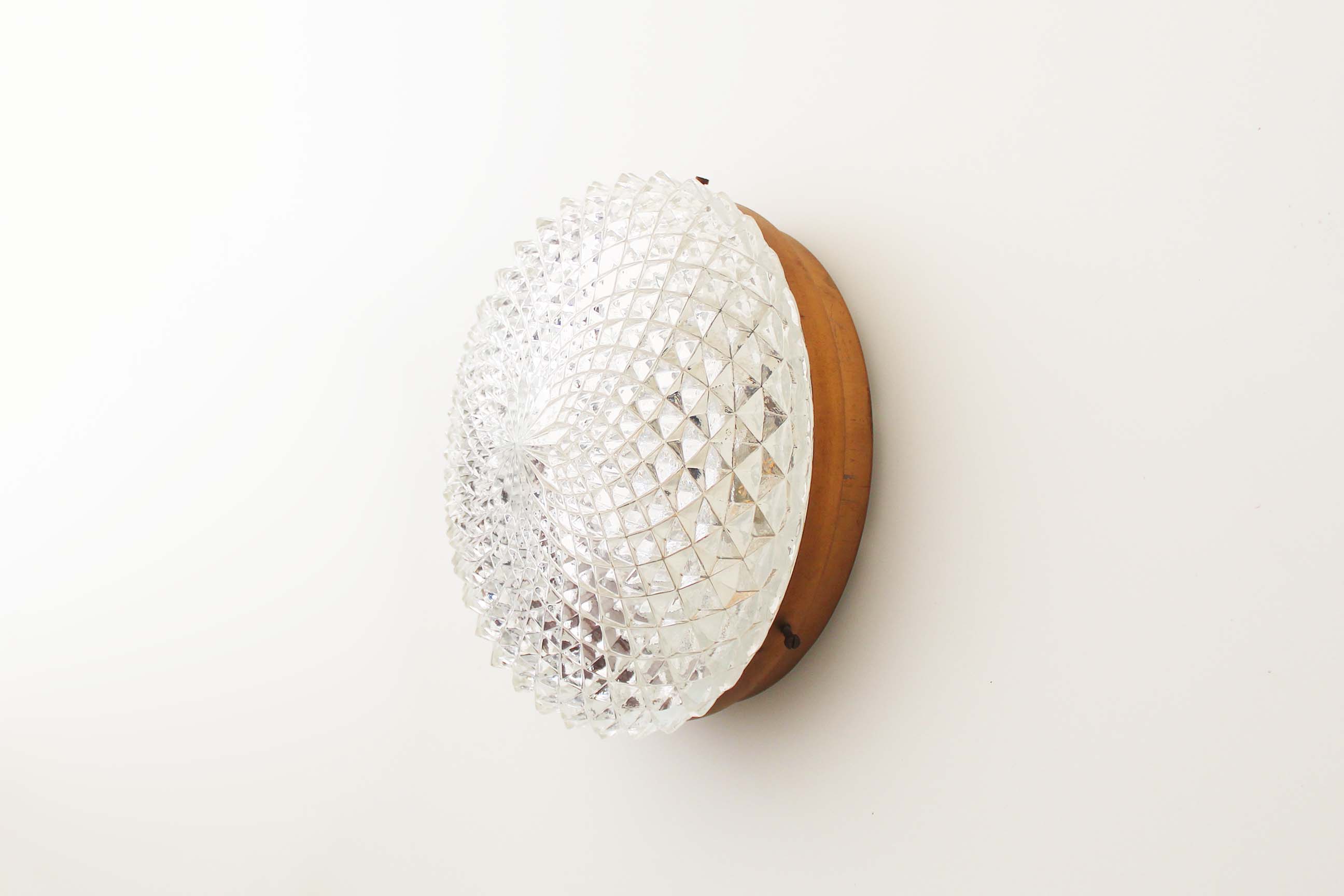 1970's Heavy round crystal glass wall sconce by Massive Belgium