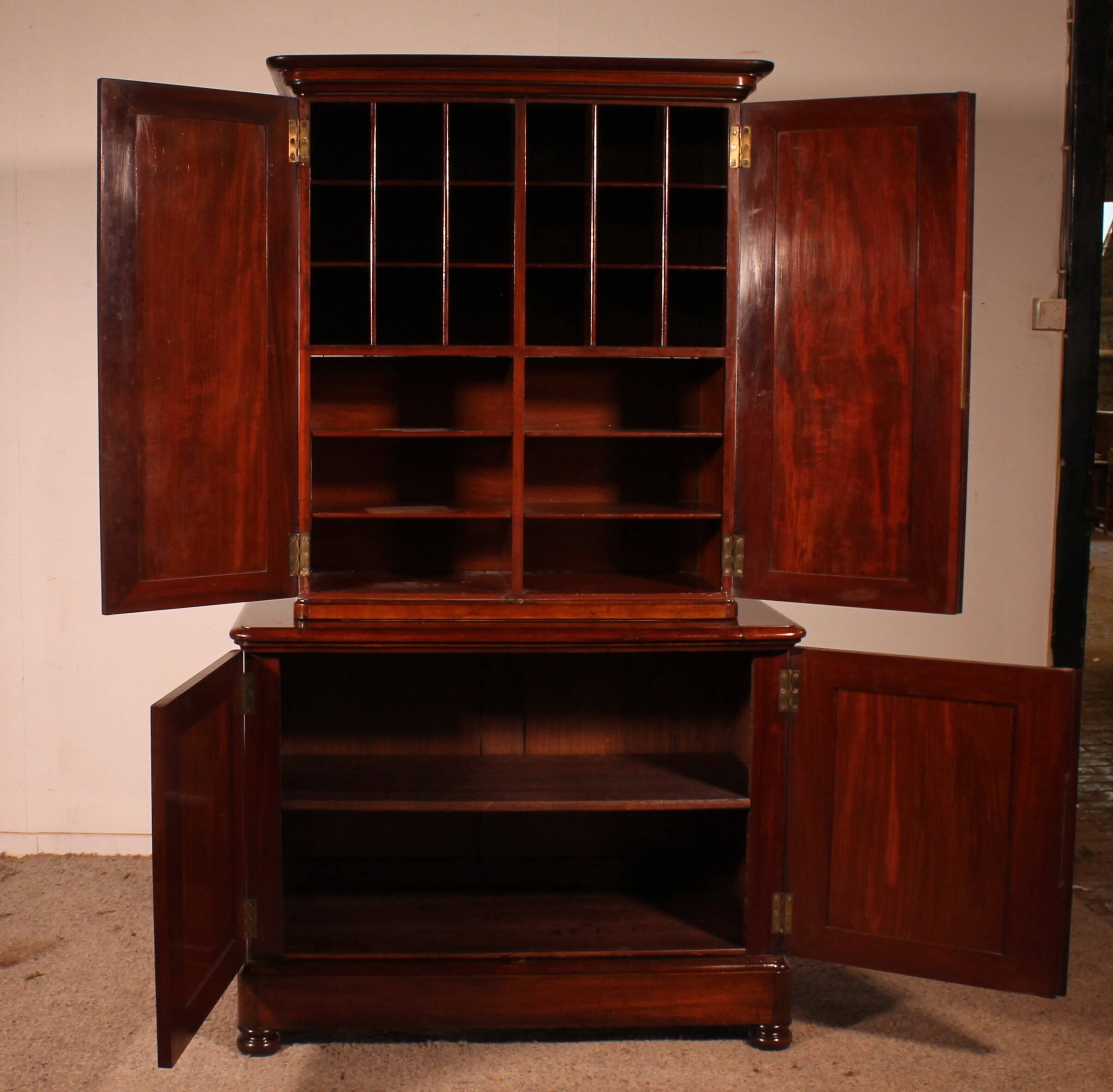 small two-body solid mahogany desk from the early 19th century with writing surface