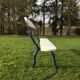 Old wooden garden bench and vine cast iron foot