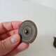 Pair of antique Empire furniture knobs from the 19th century.