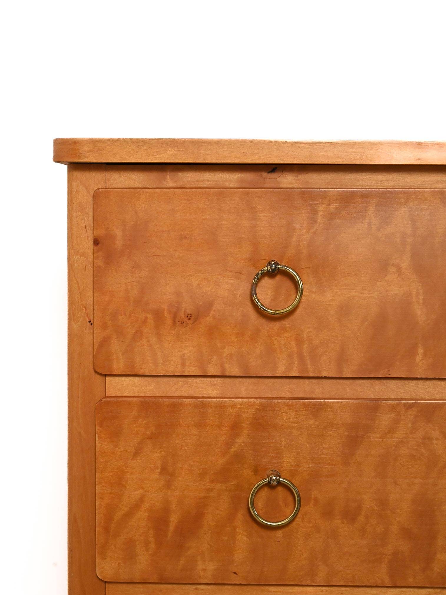 Scandinavian 1950s birch chest of drawers with brass handles