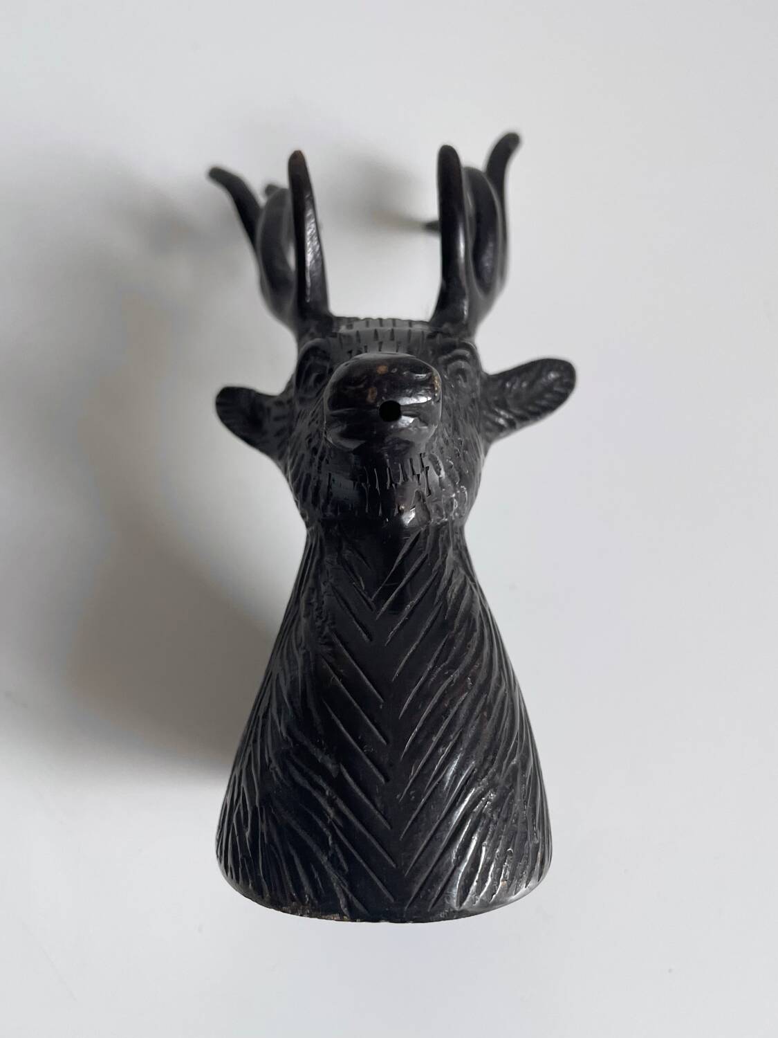 Salt and pepper shaker set with patinated brass deer heads.