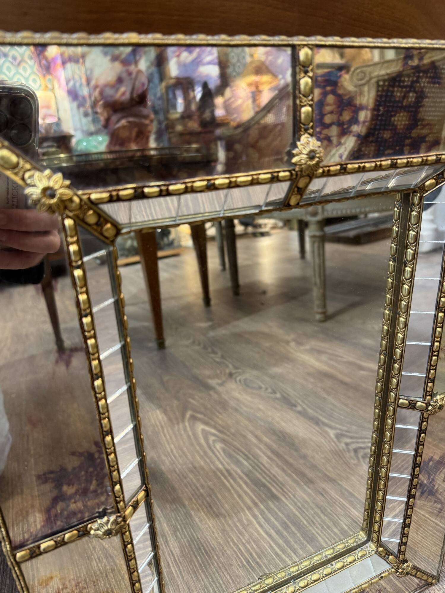 Vintage Venetian mirror with a frame from around 1970.
