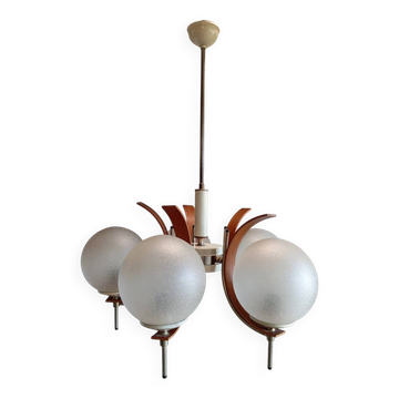 Scandinavian suspension in teak, glass, and metal.