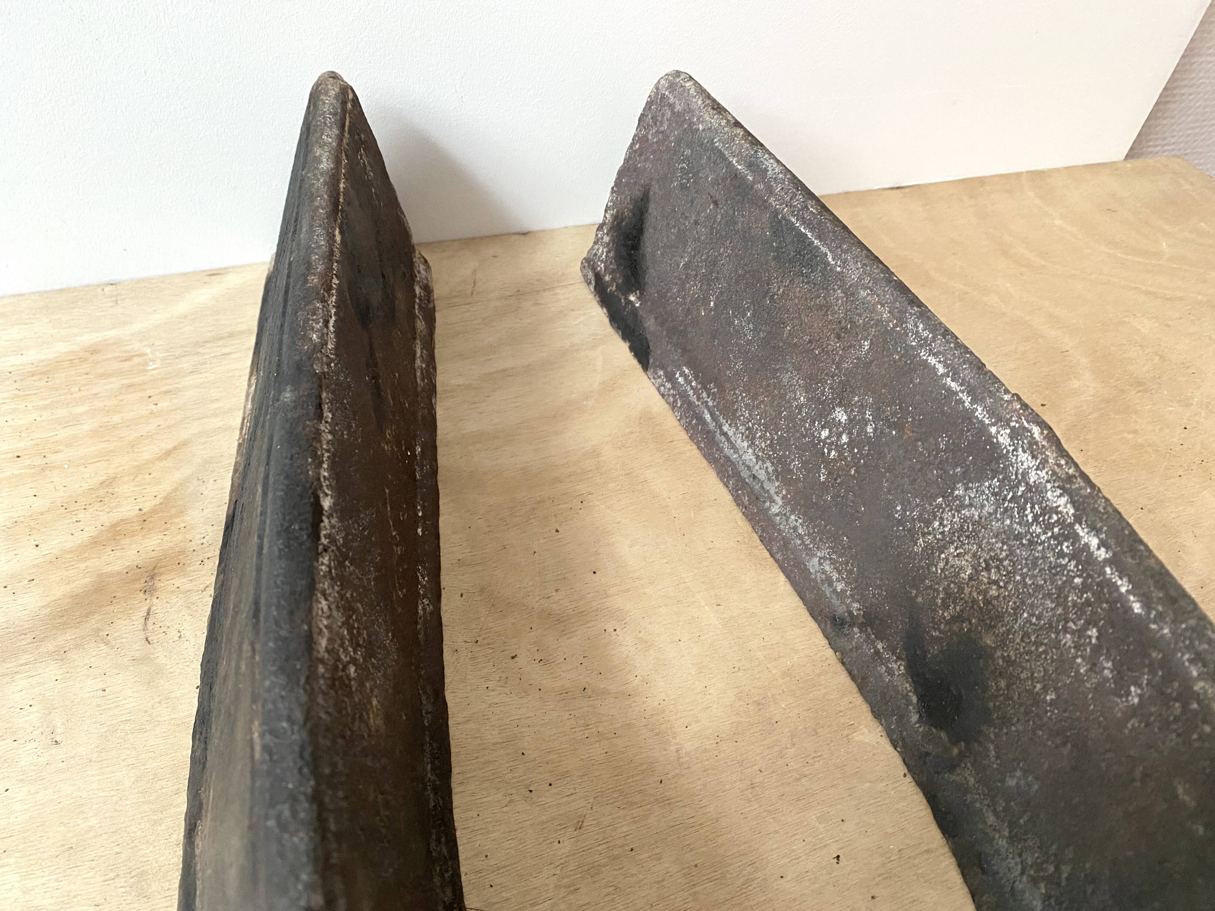 Pair of modernist anthropomorphic fireplace andirons, brutalist log holders 1950s