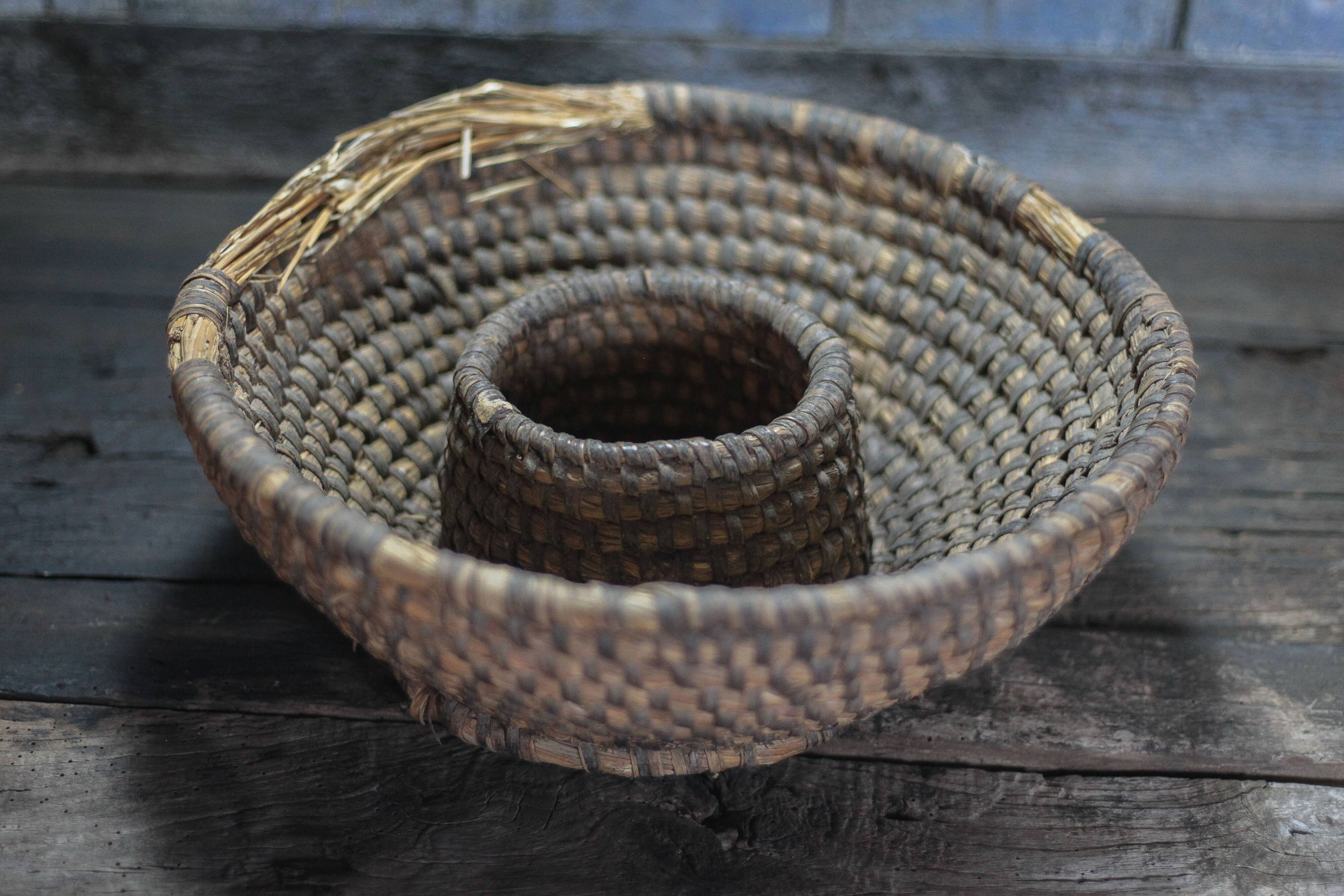 Old wicker basket, straw and bramble, woven basket, countryside.