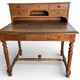 Antique oak tiered desk with stretcher, early 20th century.