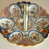 Dish, egg server in hand-painted earthenware, signed Geo Martel