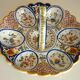Dish, egg server in hand-painted earthenware, signed Geo Martel