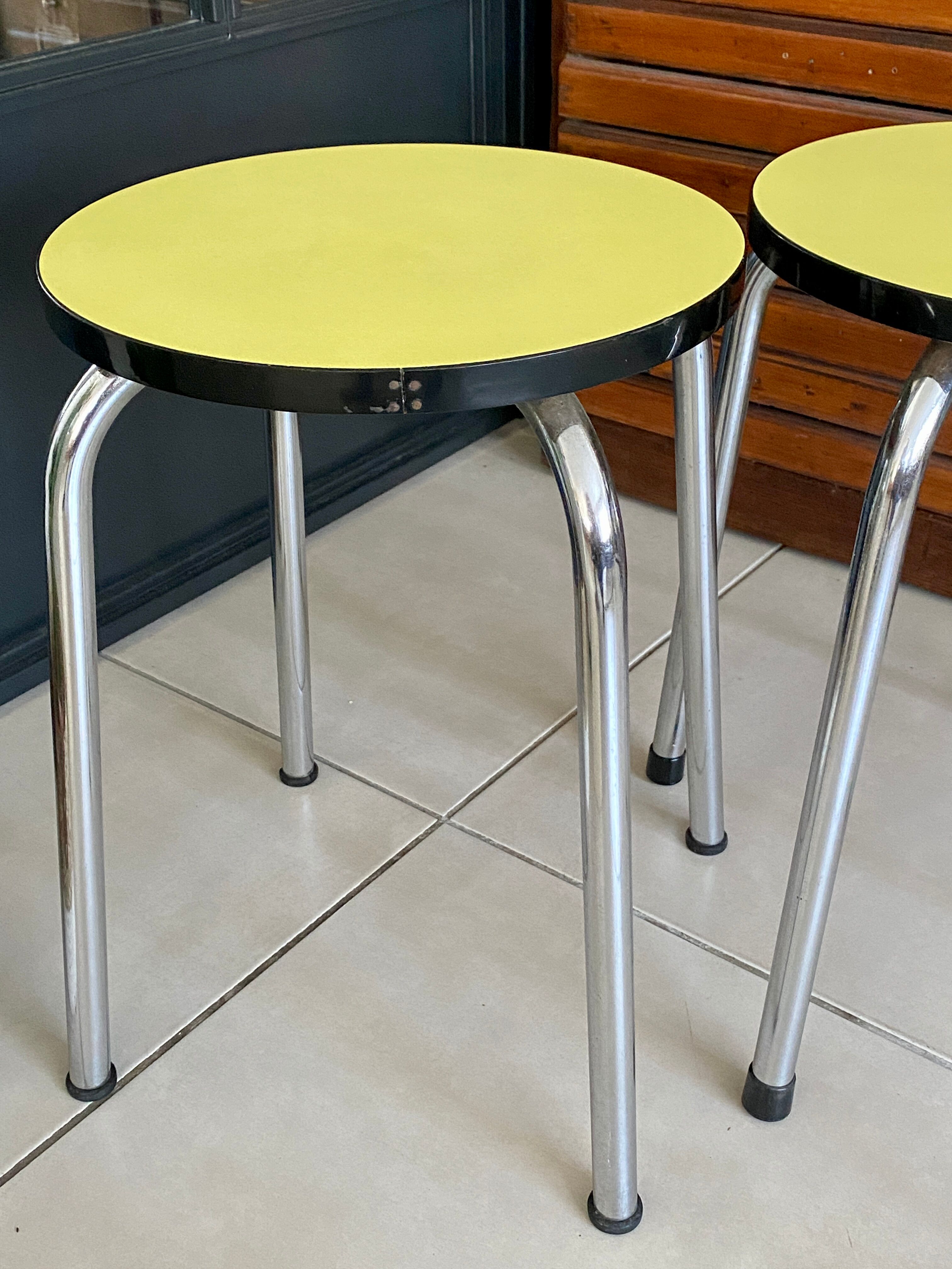 Pair of yellow Formica stools