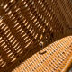 Wicker and black wrought iron armchair