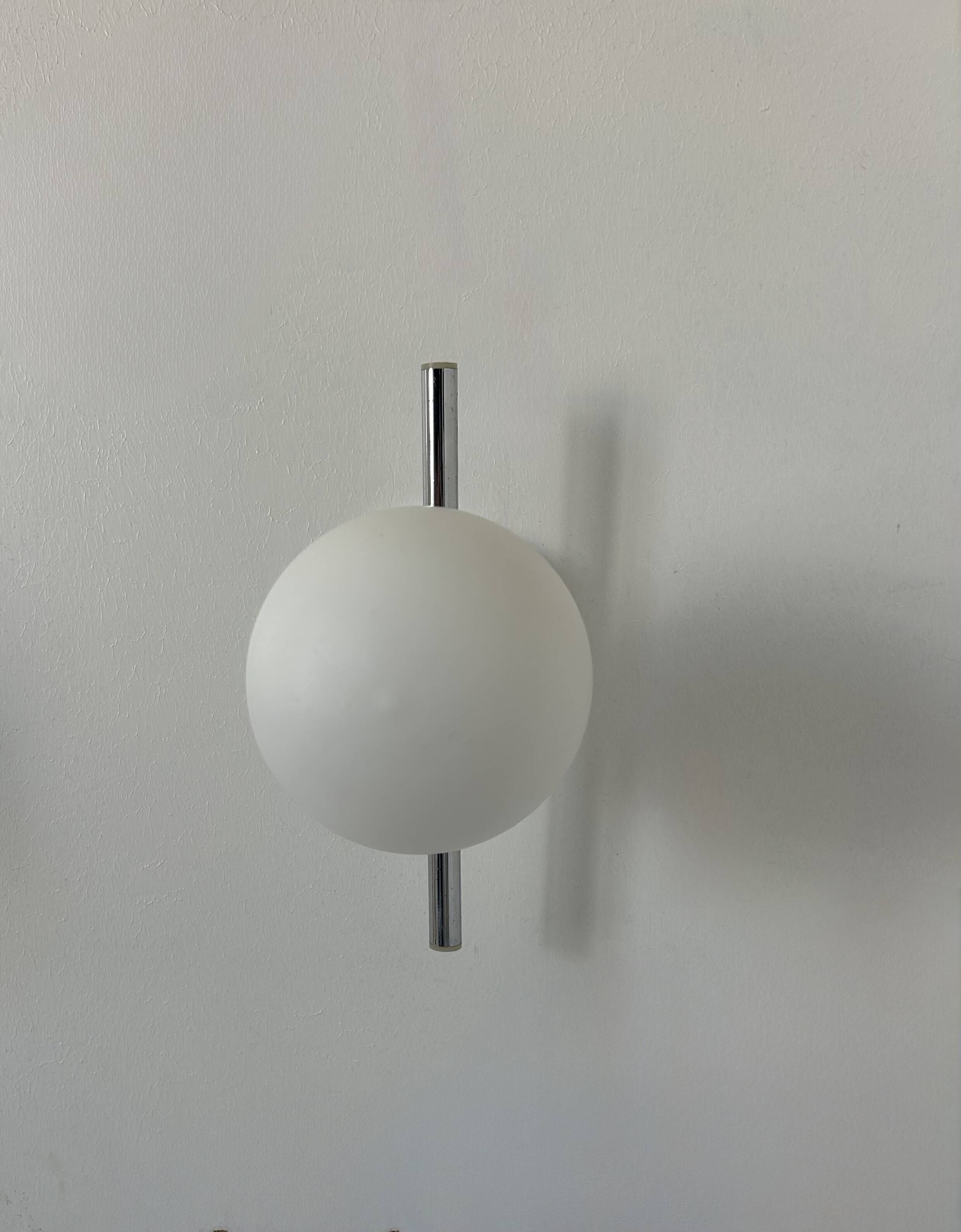 Pair of vintage chrome and opaline wall lights, France 1970.
