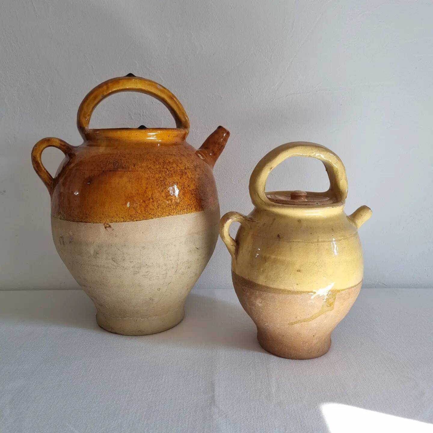 Glazed terracotta jug with lid