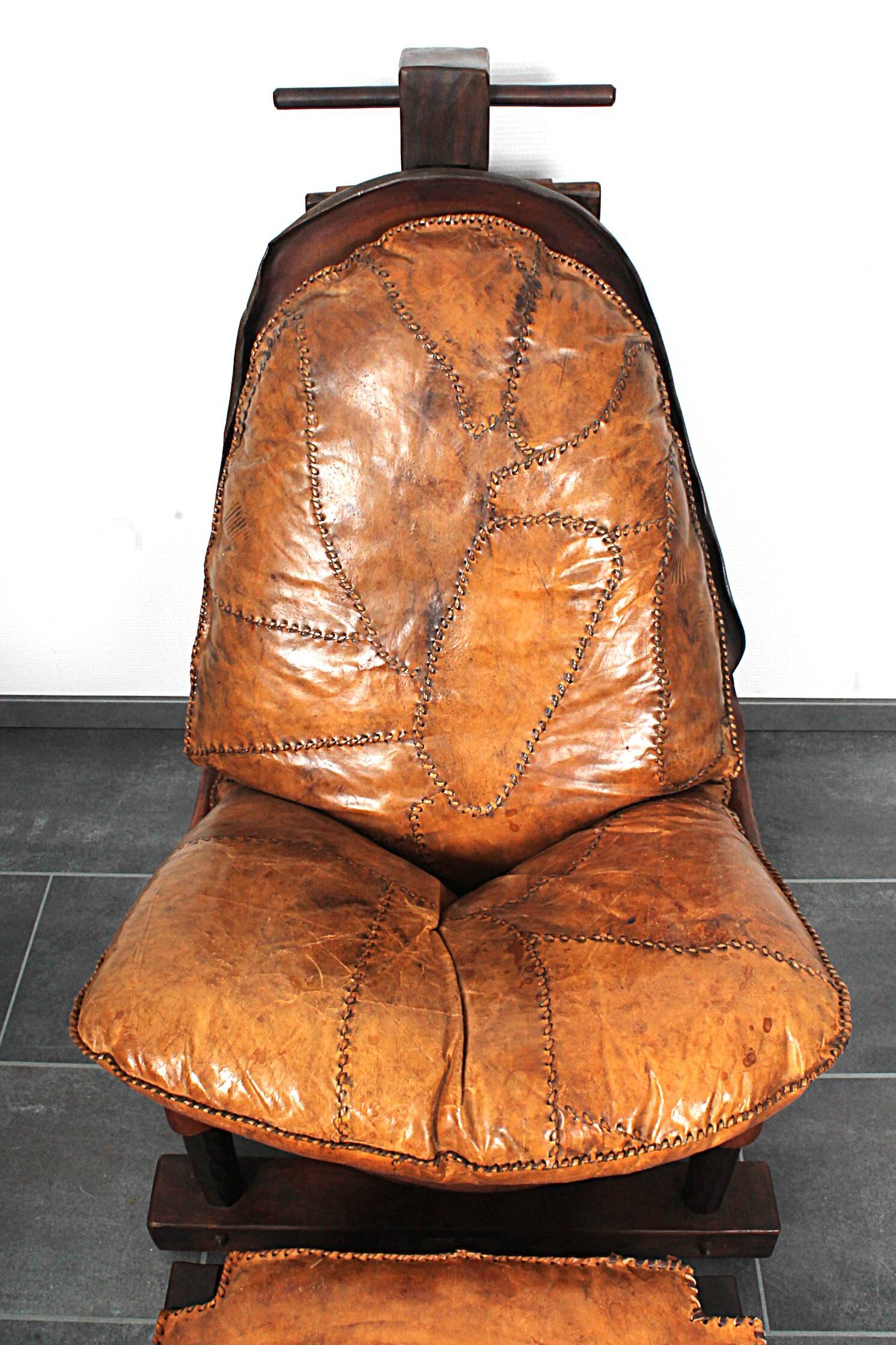 Brutalist oak lounge chair and ottoman, 1970s, set of 2