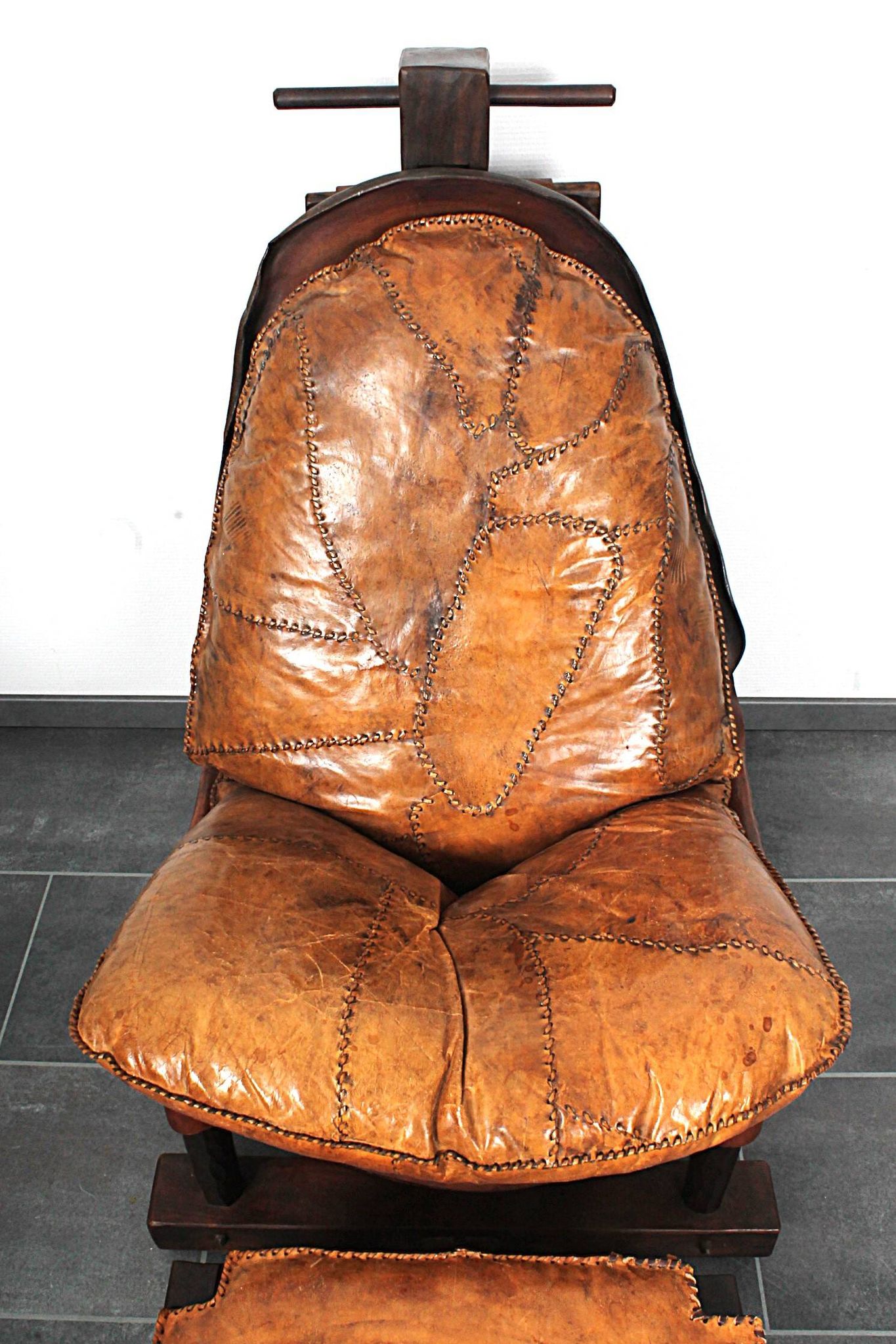 Brutalist oak lounge chair and ottoman, 1970s, set of 2