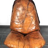 Brutalist oak lounge chair and ottoman, 1970s, set of 2