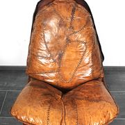 Brutalist oak lounge chair and ottoman, 1970s, set of 2