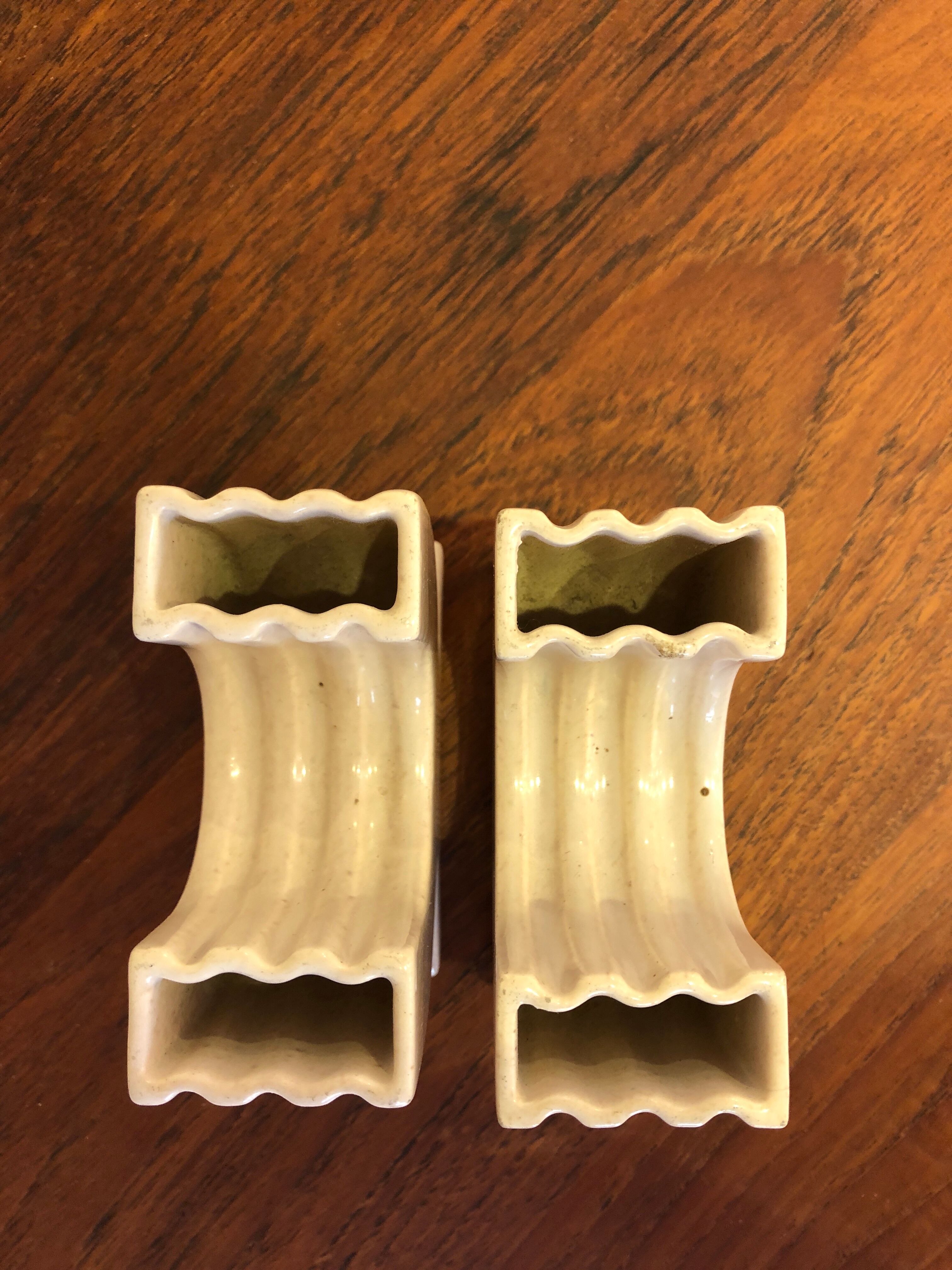 Pair of enamelled ceramic vases