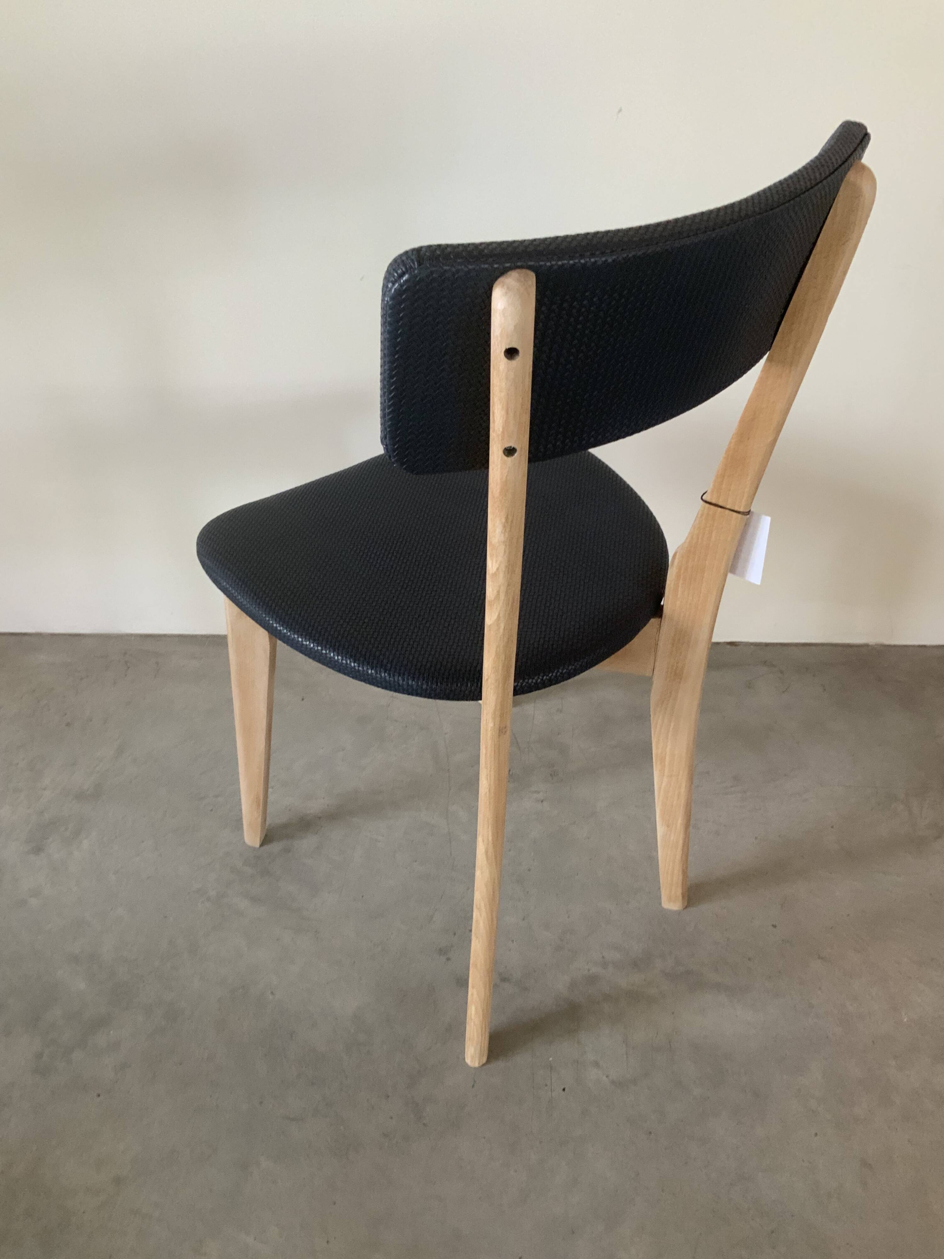 Restored vintage chair in midnight blue vinyl from the 50s