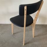 Restored vintage chair in midnight blue vinyl from the 50s