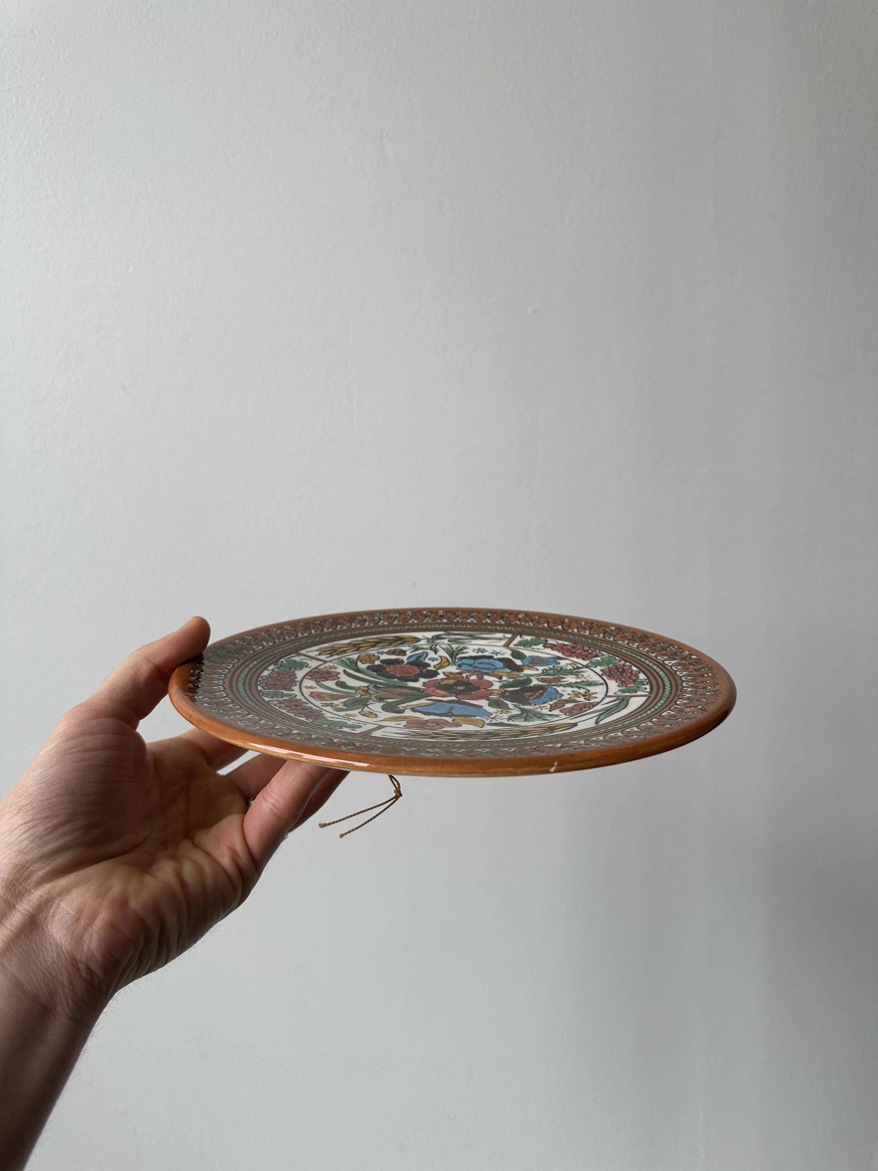 Old hand-painted plate