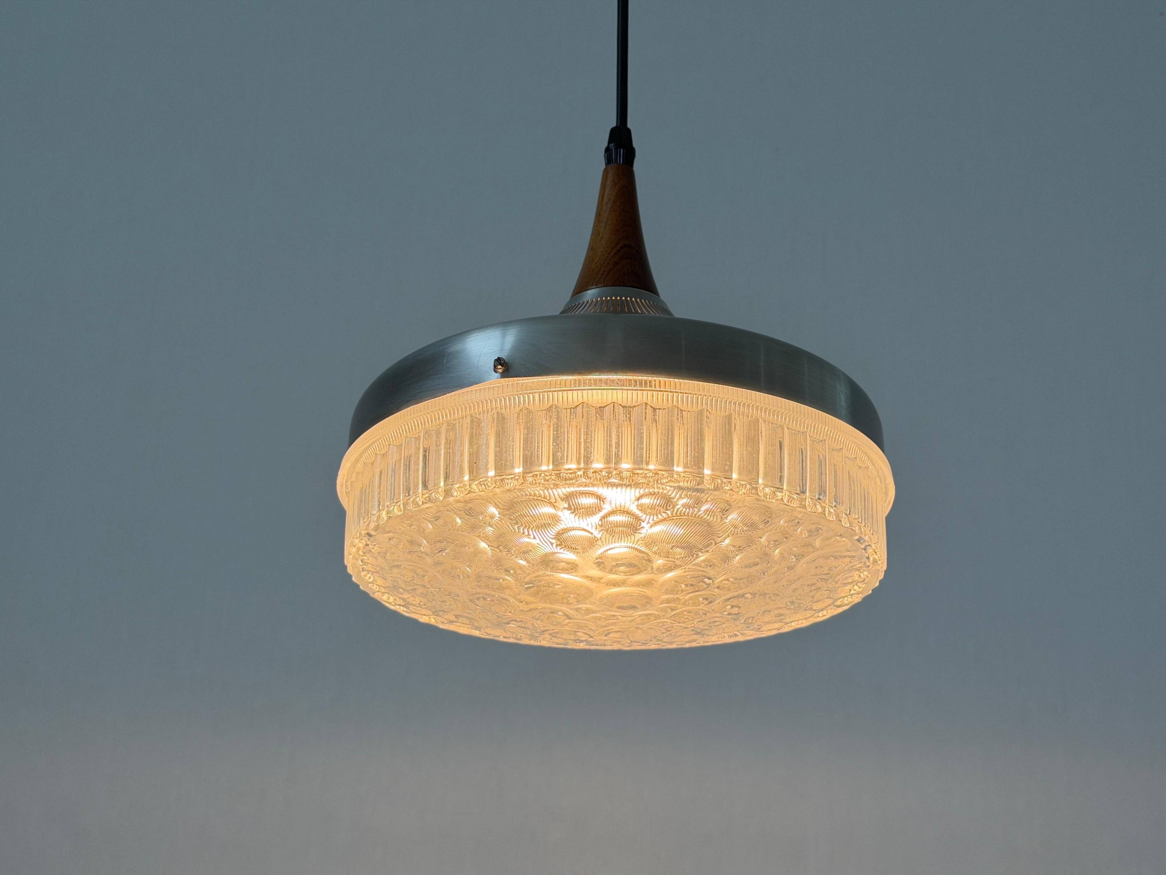 Crystal glass ceiling light with a metal frame and wood details, 1960s, Germany.