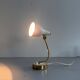 Simple table lamp with a pink metal head and brass body, 1960s, Germany.