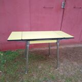 Yellow formica table with extensions